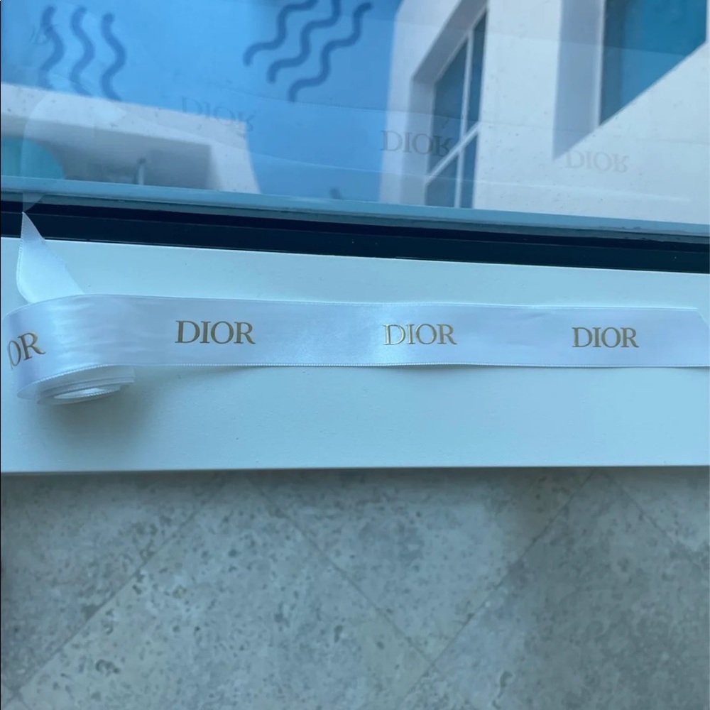 Dior Ribbon. White with gold writing. 5 feet long